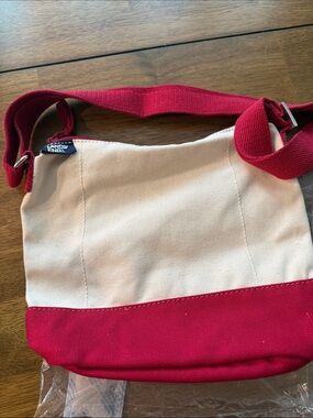 Lands' End Canvas Crossbody Bag in Natural and Scarlet with zip top closure